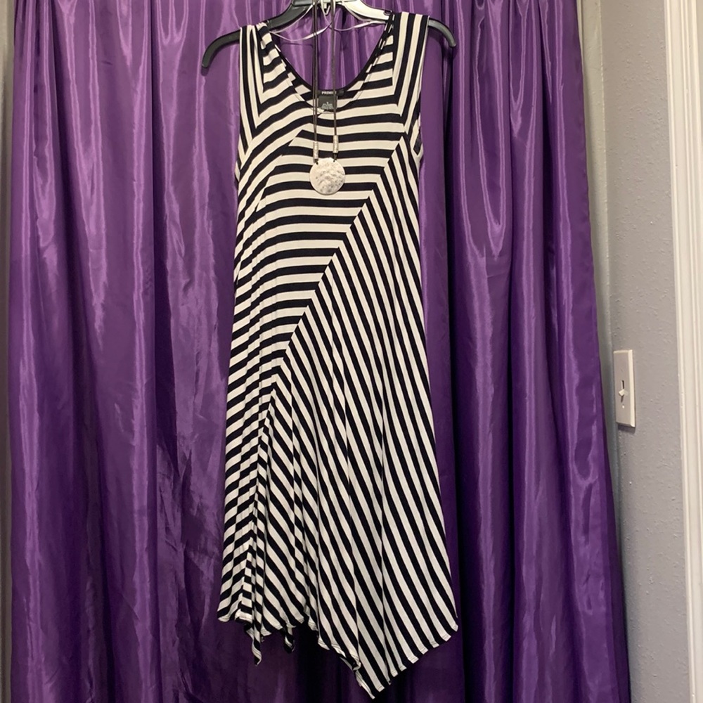 Sundress,brand new, never wore,its a small but I’m Lg & it fits has give& flare